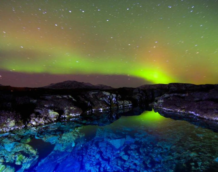 Northern lights over silfra, Iceland