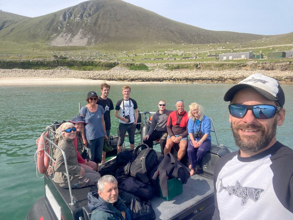group of visitors in Village Bay, St Kilda, Outer Hebrides, Scotland